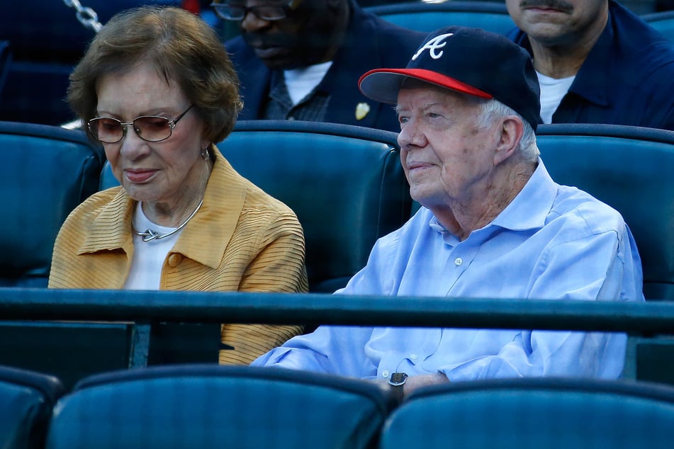 Former President Jimmy Carter and his wife Rosalynn at a baseball game at Turner Field on September 17, 2015, in Atlanta, Georgia.