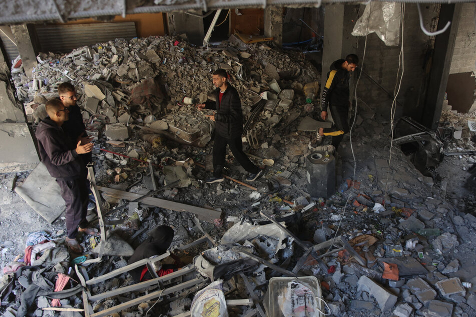 Israel pounds Gaza as Iran attack threat puts region on edge