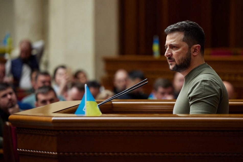 Ukrainian President Volodymyr Zelensky speaks during a session of a parliament as Russian attacks continue.