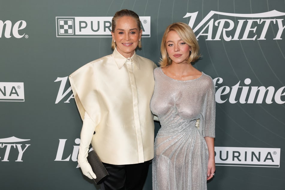 Sydney Sweeney's Euphoria co-star Sharon Stone (l.) spilled what she told Sydney about her controversial jeans campaign for American Eagle.