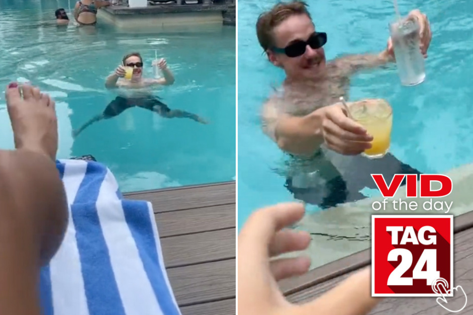Today's Viral Video of the Day features a man who got lucky after trying to swim with two drinks in his hands!