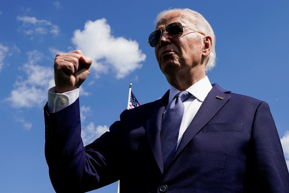 Biden visits WWI cemetery in France in rebuke to Trump "loser" comments