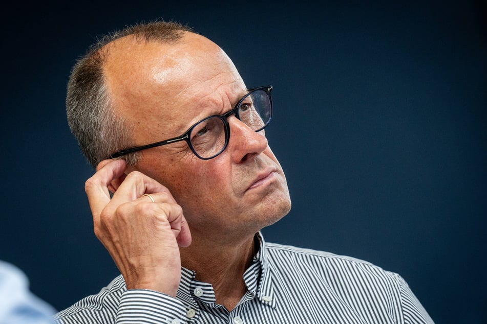 CDU-Chef Friedrich Merz (68) ist auf Kretschmers Seite - meistens.