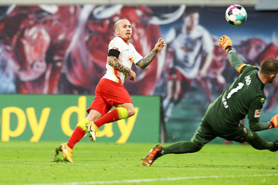 Angelino (left) missed two huge chances in the first 45 minutes.