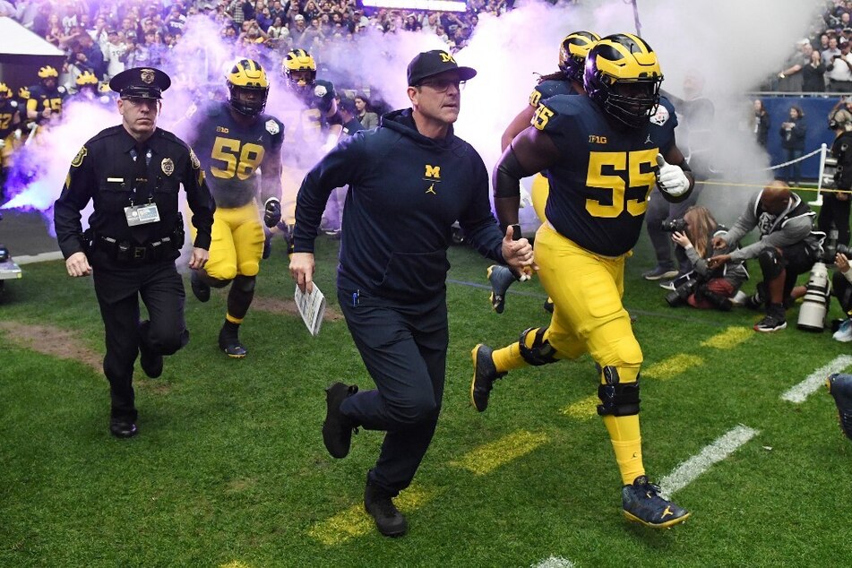 Michigan coach Jim Harbaugh could be ousted from multiple games this season
