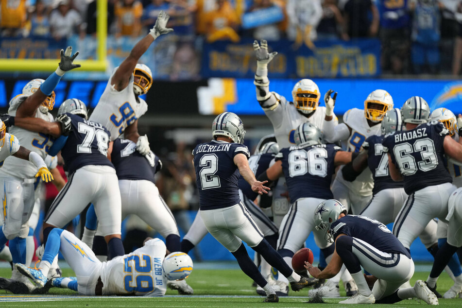 Cowboys kicker Greg Zuerlein (c) kicks the winning field goal against the Chargers on Sunday.