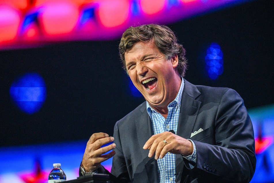 Tucker Carlson speaking at the Turning Point Action USA conference in West Palm Beach, Florida, on July 15, 2023.
