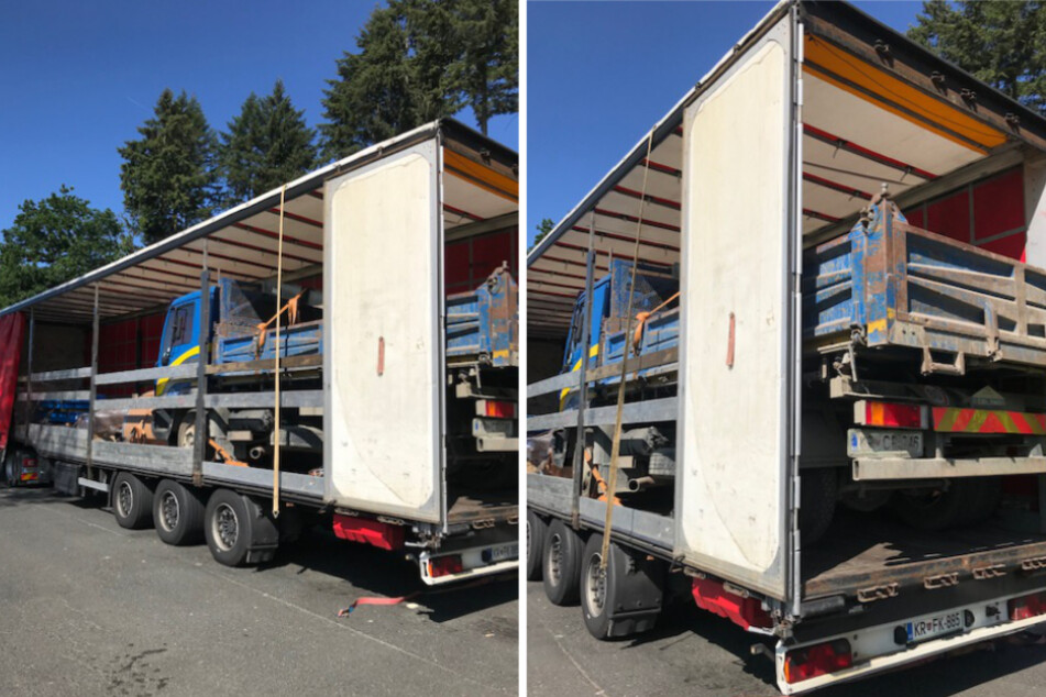 Der Zwölf-Tonner passt nur bei offenen Heck-Türen in den Anhänger des Sattelzuges.