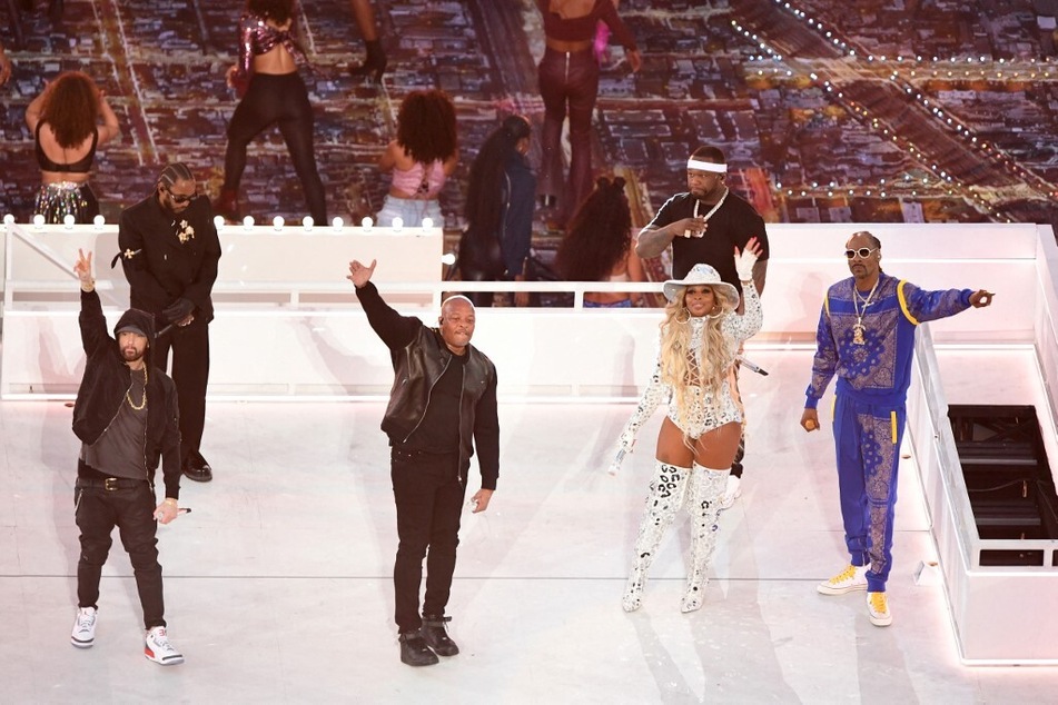 Rappers Eminem (l), Dr. Dre (center l.), Kendrick Lamar (back l.), 50 Cent, Snoop Dogg (r), and Mary J. Blige (center r.) perform during the Super Bowl LVI Halftime Show on February 13.