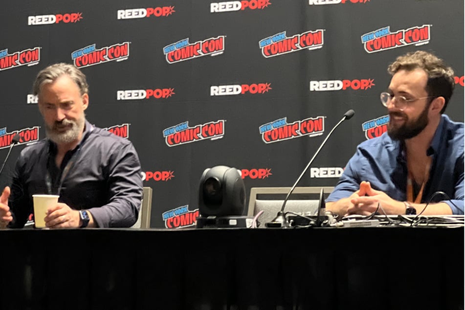 Jim Butcher (l.) discussed his fantasy novels during a Spotlight panel at NYCC 2023, moderated by his son, author James J. Butcher.