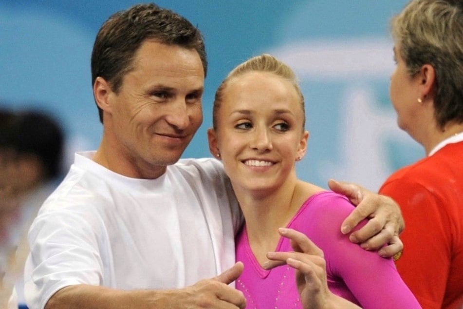 Valeri Liukin (l.) and daughter Nastia Liukin celebrates her gold medal win at the 2008 Beijing Olympic Games.