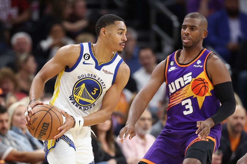 The Golden State Warriors are making a major trade with the Washington Wizards in order to acquire Chris Paul (r).