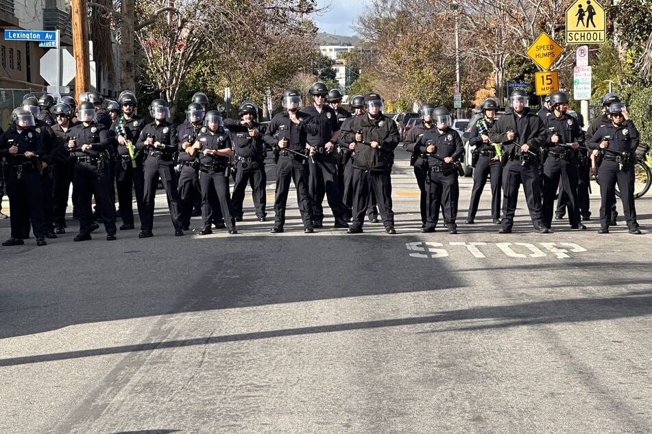 Police gather to suppress Palestine solidarity protests ahead of the 97th Academy Awards in Los Angeles, California.