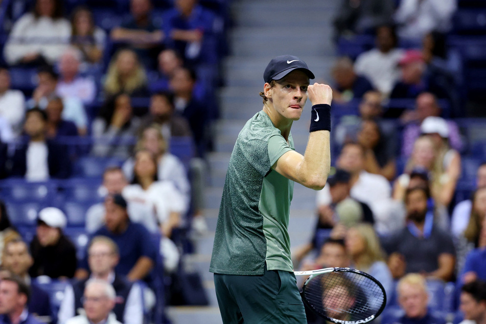 Italy's Jannik Sinner reacts during his quarterfinal match against Russia's Daniil Medvedev at the 2024 US Open.