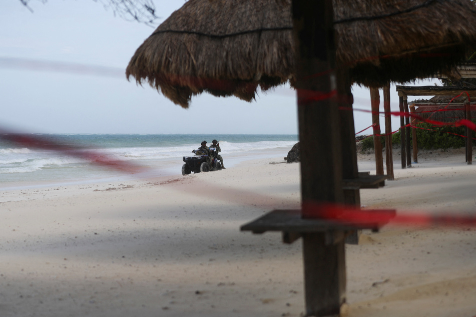 Members of the Mexican army patrol at the beach in Tulum, Mexico, ahead of the arrival of Hurricane Beryl.