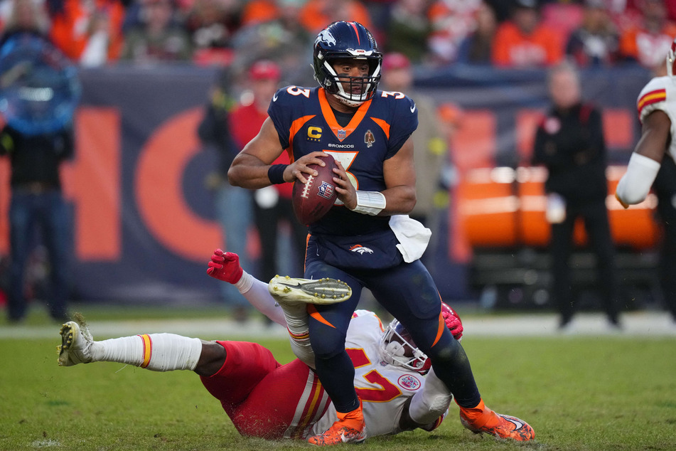 The Broncos' Russell Wilson threw three touchdown before having to go off with a concussion.