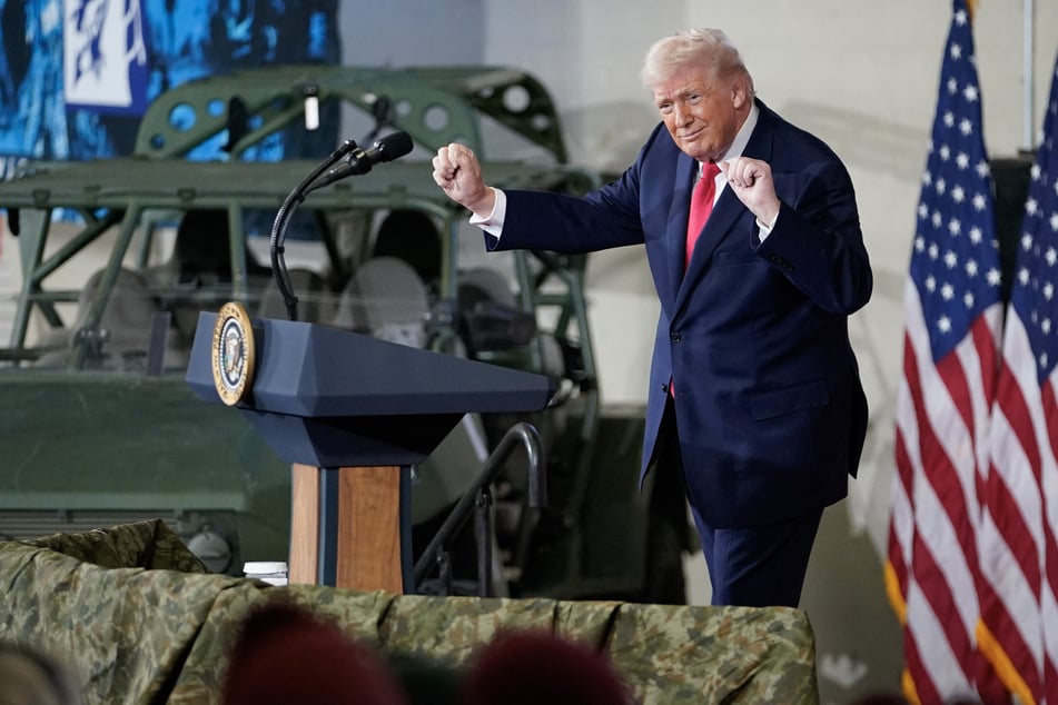 US President Donald Trump is seen dancing during a visit to the Fort Bragg US Army base on Friday in Fort Bragg, North Carolina.