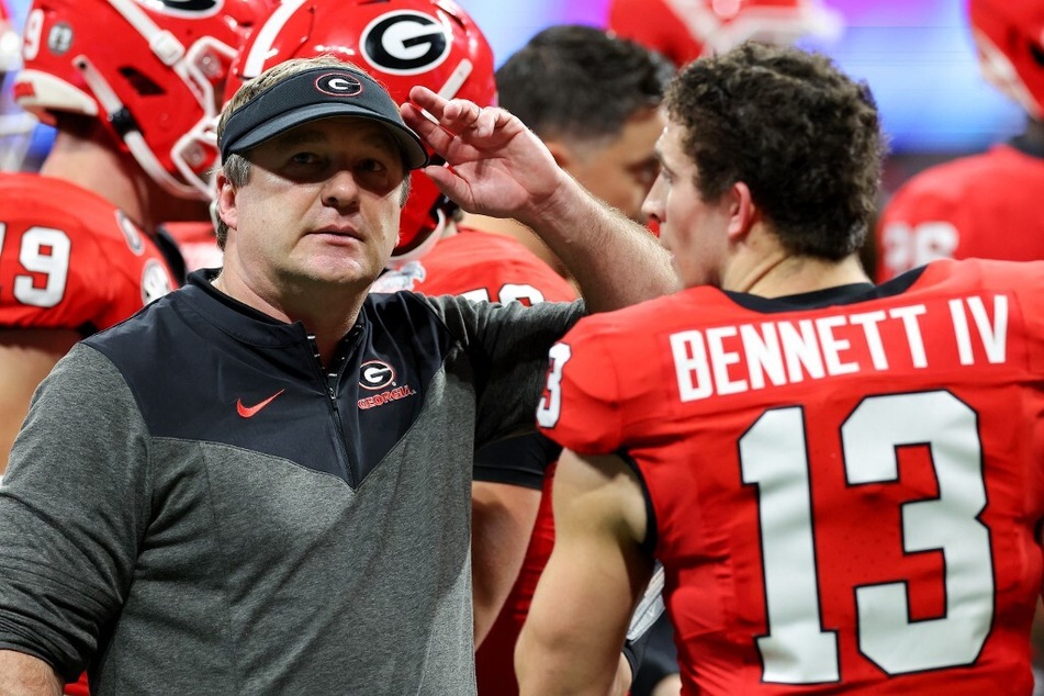 On Monday, coach Kirby Smart (l) will lead his Georgia team in the CFP National Championship game against TCU and will try and become the first team since 2012 to win back-to-back titles.