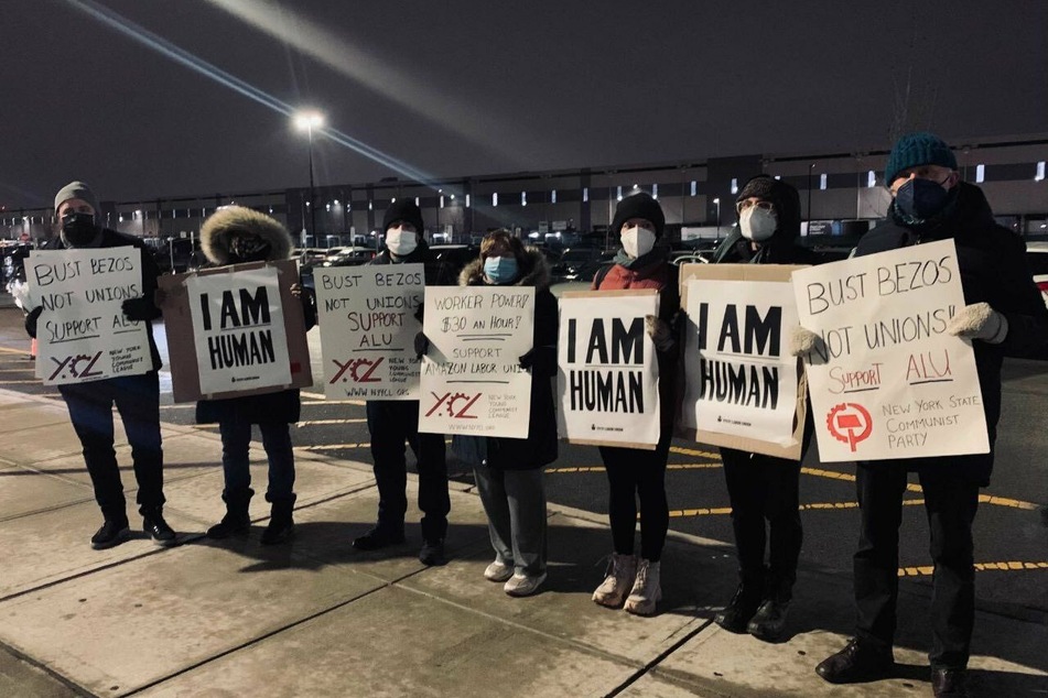 Amazon workers and allies in New York rally in support of a union.