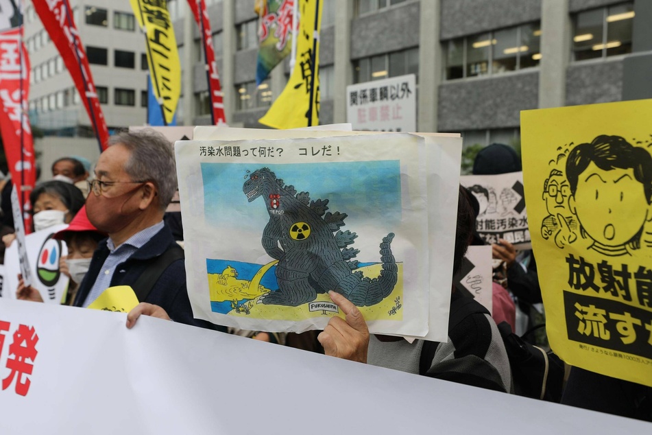 People rally in Tokyo to protest against the Japanese government's decision to discharge contaminated radioactive wastewater into the sea.