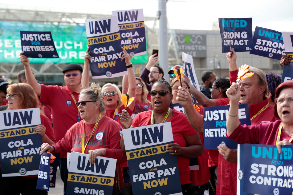 United Auto Workers members from Louisville, Kentucky, rally in support of striking UAW workers in Detroit, Michigan.