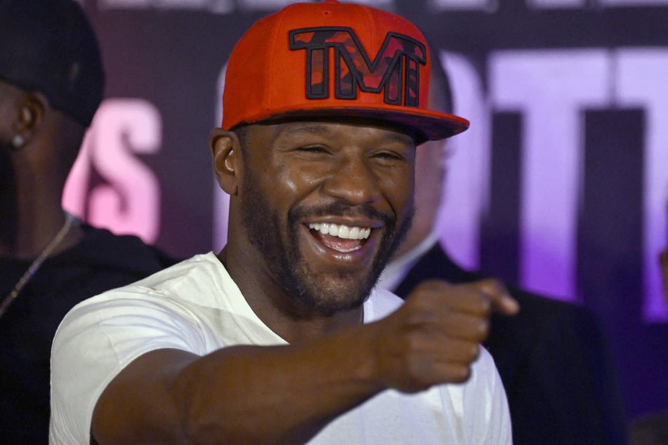 Floyd Mayweather Jr. gestures during the weighing ceremony for his exhibition fight against John Gutti III in Mexico City on August 23, 2024.