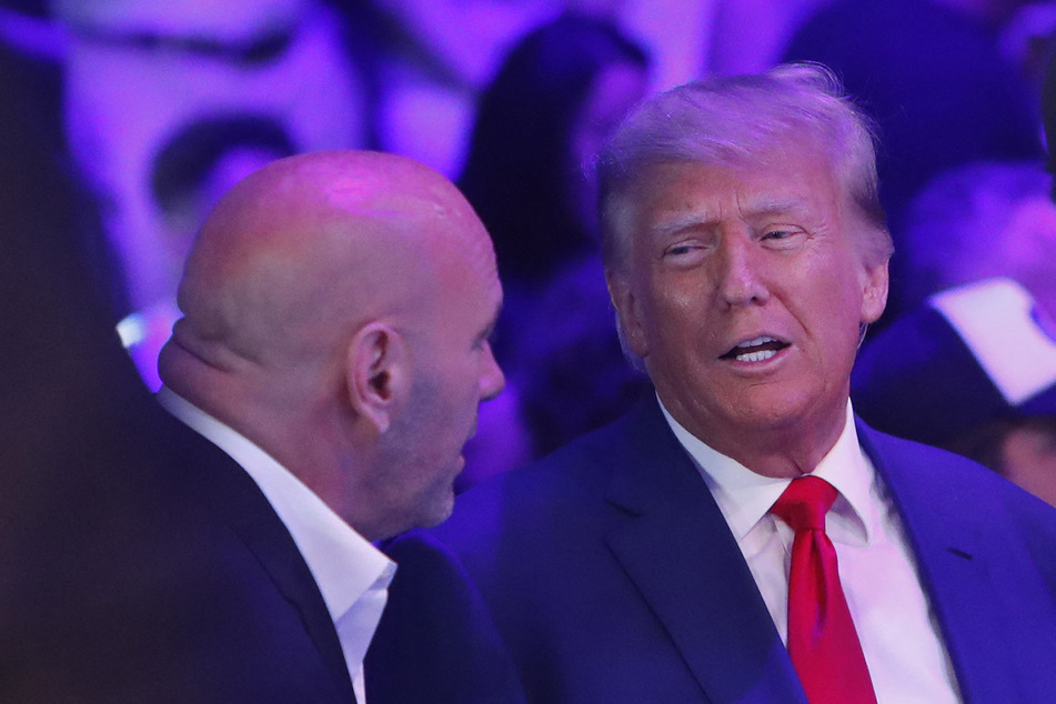 Donald Trump (r.) attends UFC 290 and talks with UFC President Dana White.