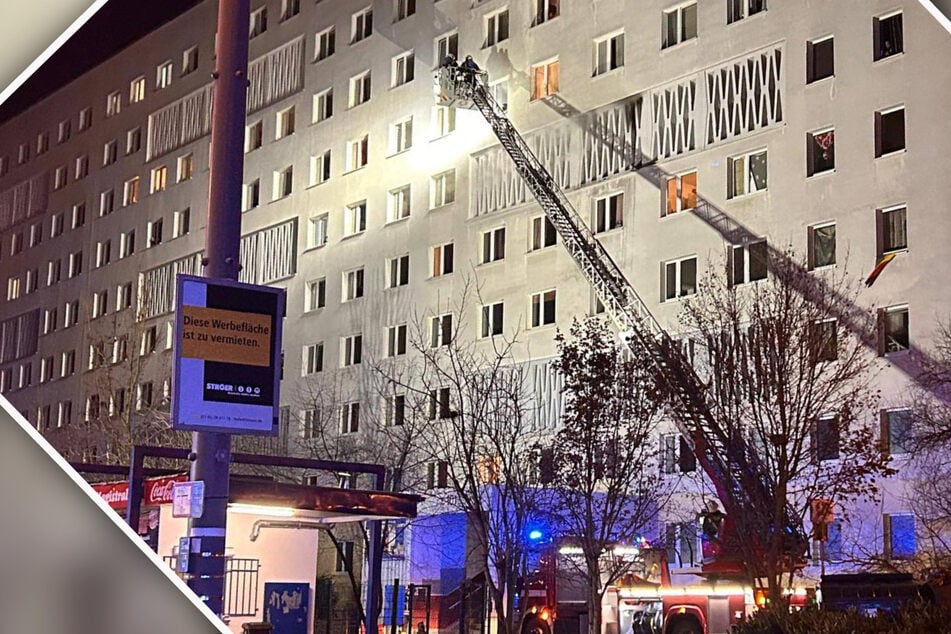 Anwohner müssen ihre Wohnungen verlassen: Möbel in Plattenbau-Flur stehen in Flammen