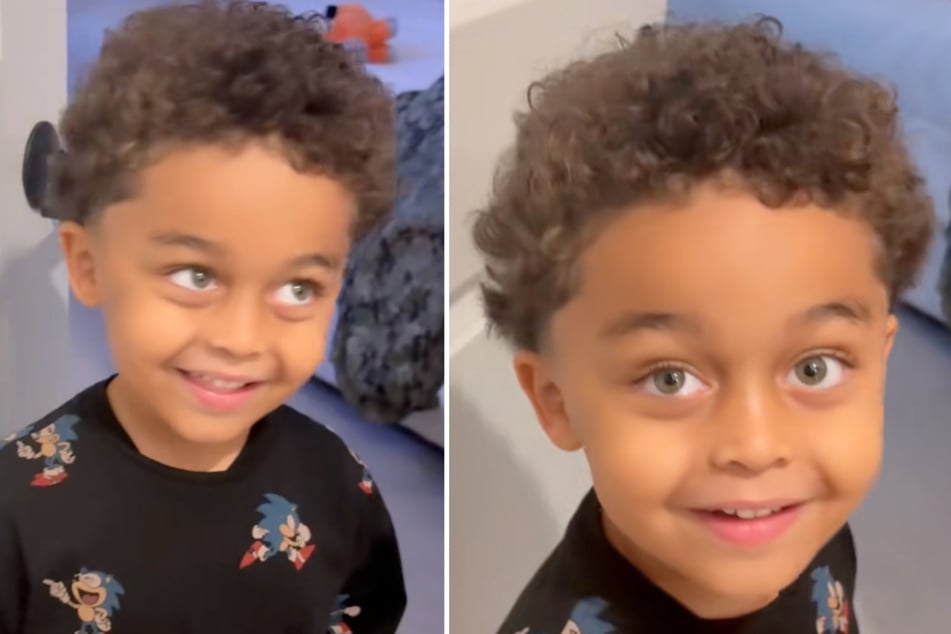 Nach einer kurzen Schock-Reaktion kann der Vierjährige wieder grinsen. An den neuen Look seines Papas muss er sich dennoch erst einmal gewöhnen.
