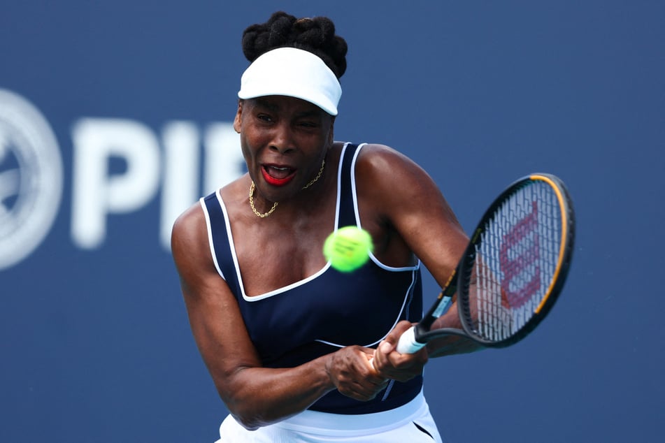 Venus Williams of the US hits a shot to Diana Shnaider of Russia during her women's singles match during the Miami Open at Hard Rock Stadium on March 19, 2024, in Miami Gardens, Florida.