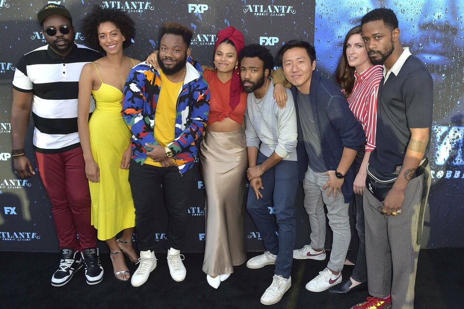 (From l. to r.) Brian Tyree Henry, Stefani Robinson, Stephen Glover, Zazie Beetz, Donald Glover, Hiro Murai, Dianne McGunigle, and Lakeith Stanfield.