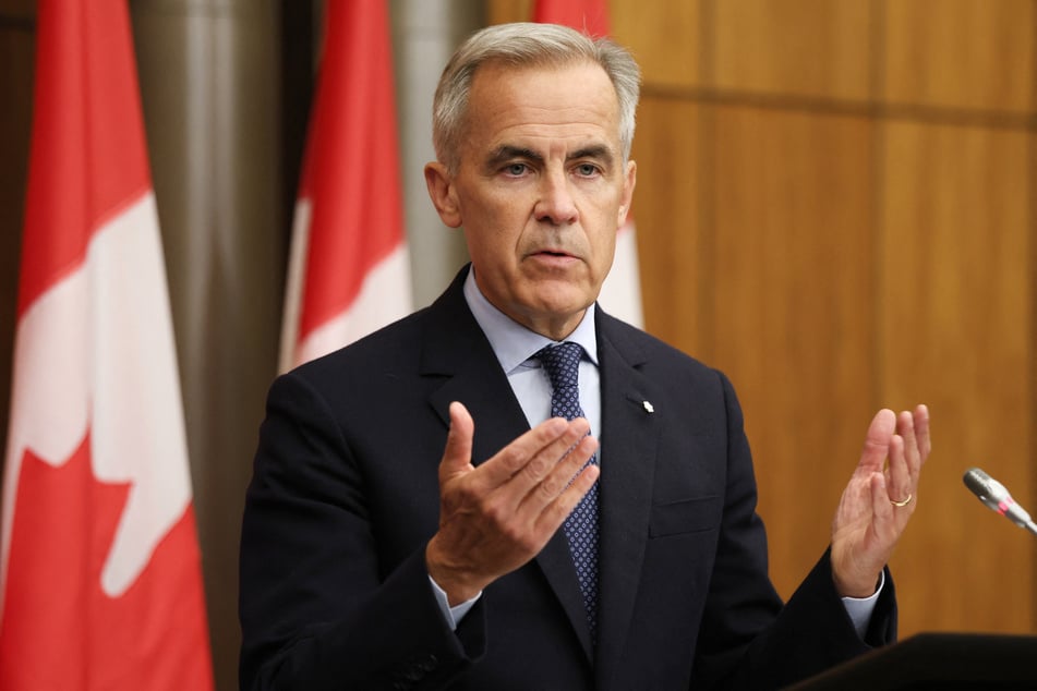 More than 85% of trade between the US and Canada remains tariff-free, Prime Minister Mark Carney (pictured) said Tuesday, days after President Donald Trump hiked levies on some Canadian goods.