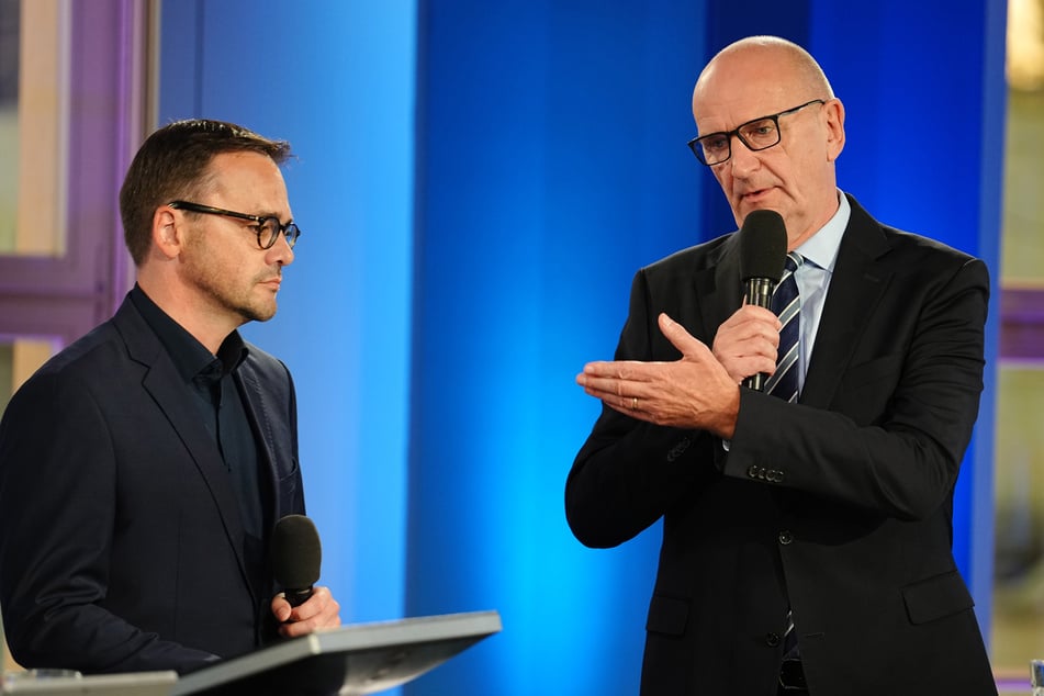 Ministerpräsident Dietmar Woidke (62, SPD, r.) hat die Landtagswahl mit seiner Partei gewonnen.