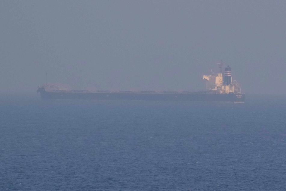 A ship carrying Ukrainian grain is seen in the Black Sea near the port of Odesa amid Russia's invasion.