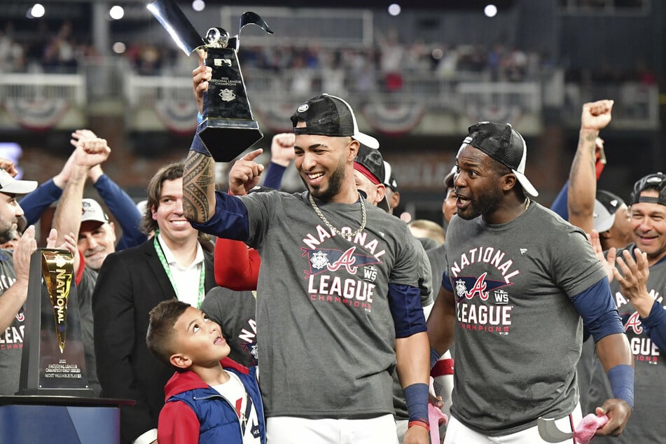 Braves left fielder Eddie Rosario (c) was named the 2021 NLCS Most Valuable Player.