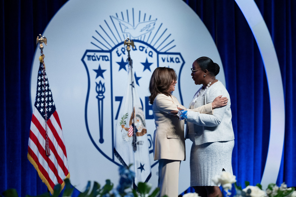 Kamala Harris (l.) was welcomed by Stacie NC Grant, international president of Zeta Phi Beta Sorority Inc., for a keynote speech in Indianapolis.