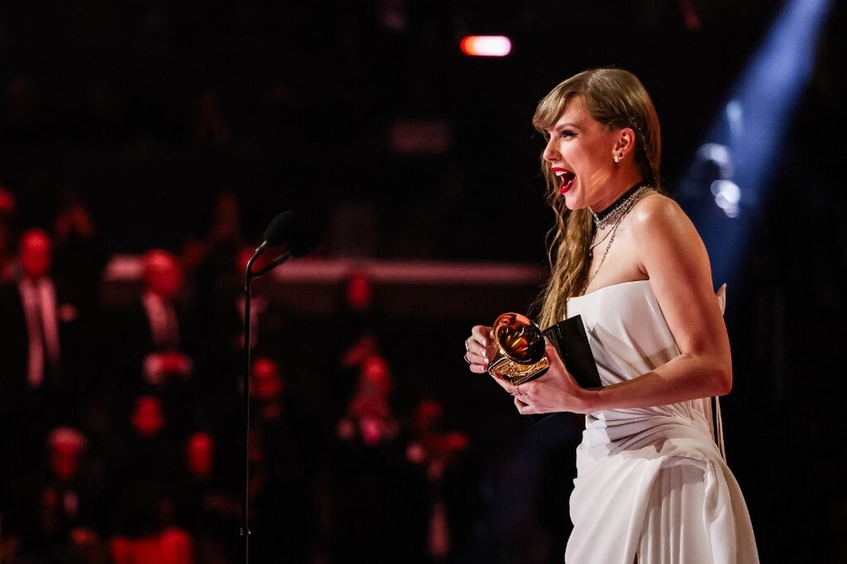 Taylor Swift accepts the Album Of The Year award for Midnights during the 66th Grammy Awards on February 4, 2024, in Los Angeles, California.