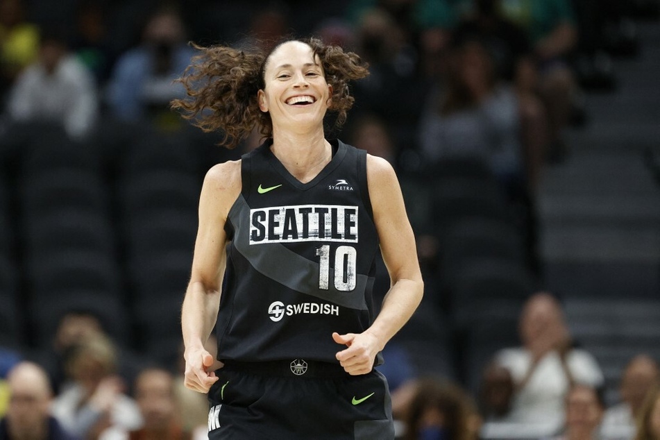 Sue Bird of the Seattle Storm smiles bright after scoring against the Las Vegas Aces.