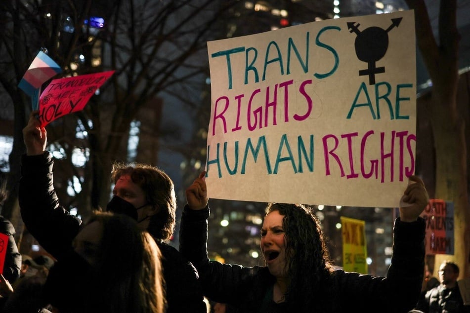 Hundreds of people protest in New York City on February 3, 2025, against President Donald Trump’s executive order to restrict access to gender-affirming care for people under the age of 19.