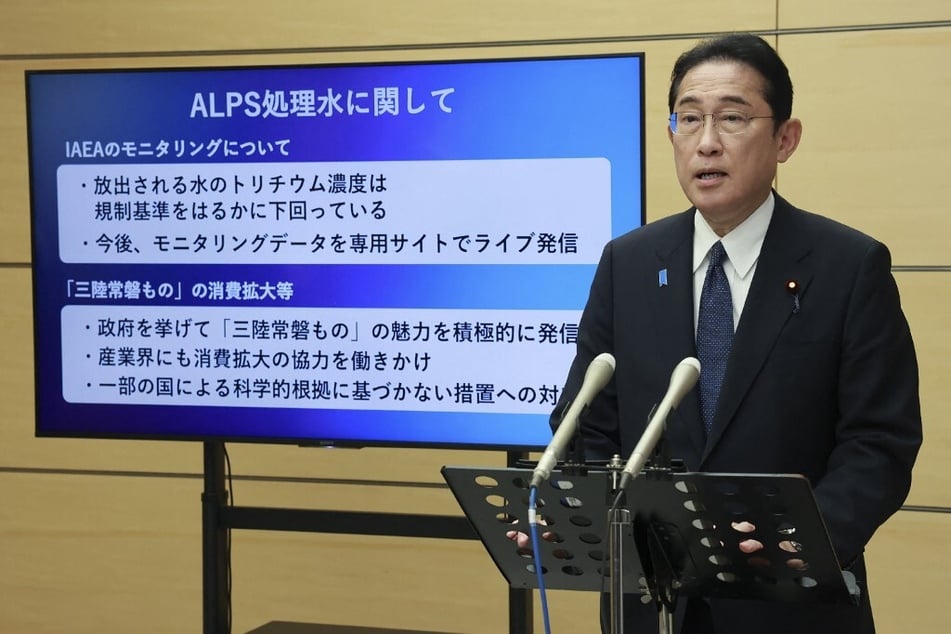 Japan's Prime Minister Fumio Kishida speaks to reporters about radioactive water from the Fukushima Daiichi Nuclear Power Plant on August 24, 2023.