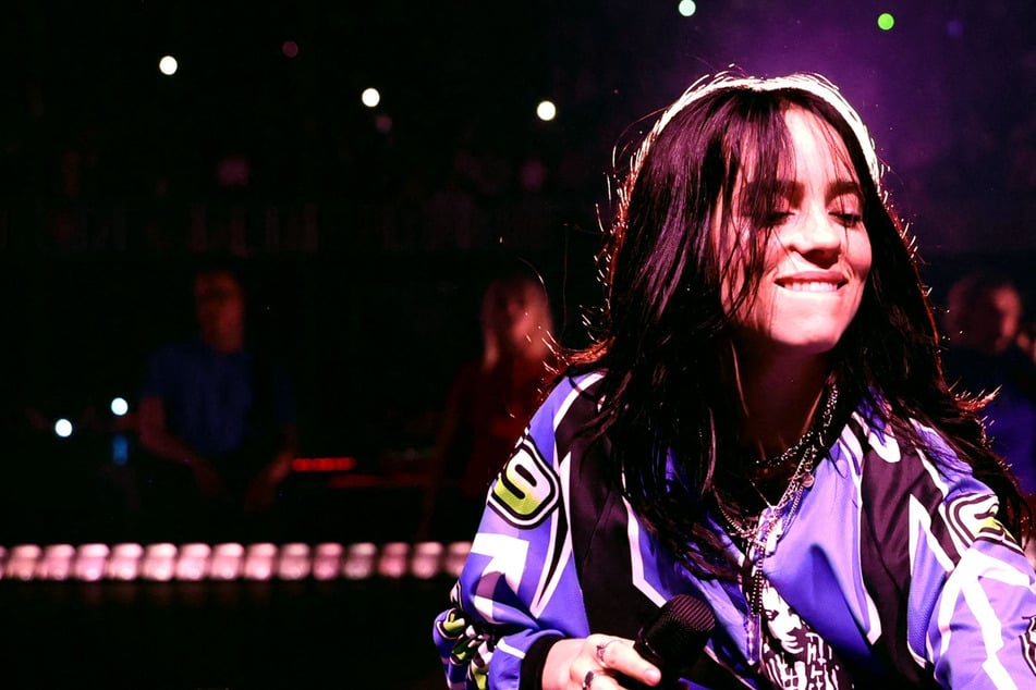 Billie Eilish violently grabbed by fan in scary concert incident