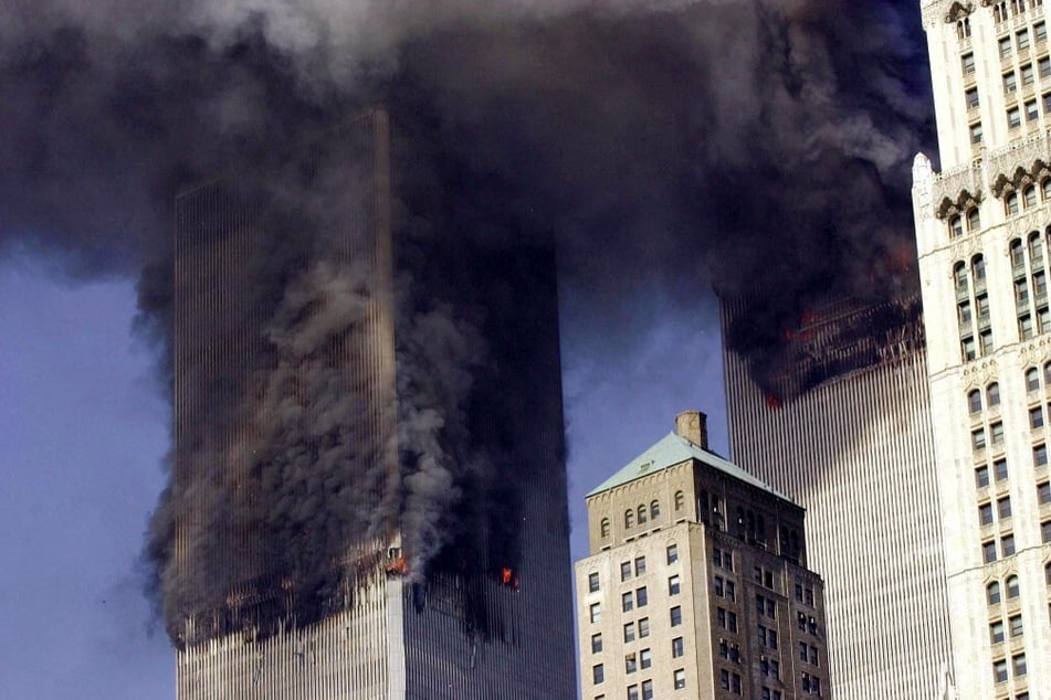 Smoke billows from the twin towers of the World Trade Center in lower Manhattan, New York, on September 11, 2001.