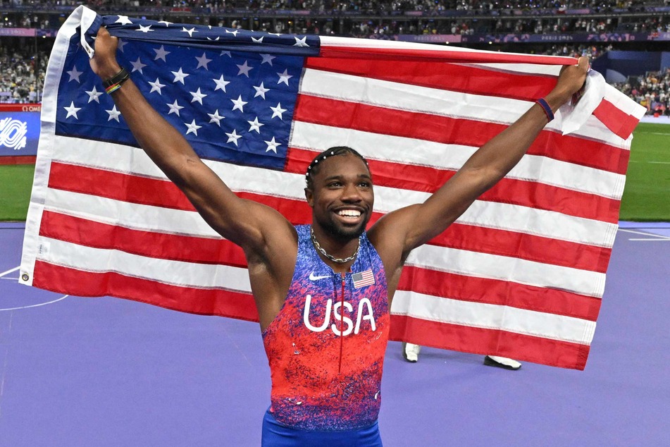 US' Noah Lyles celebrates after winning the men's 100m final of the athletics event at the Paris 2024 Olympic Games at Stade de France in Saint-Denis, north of Paris, on Sunday.