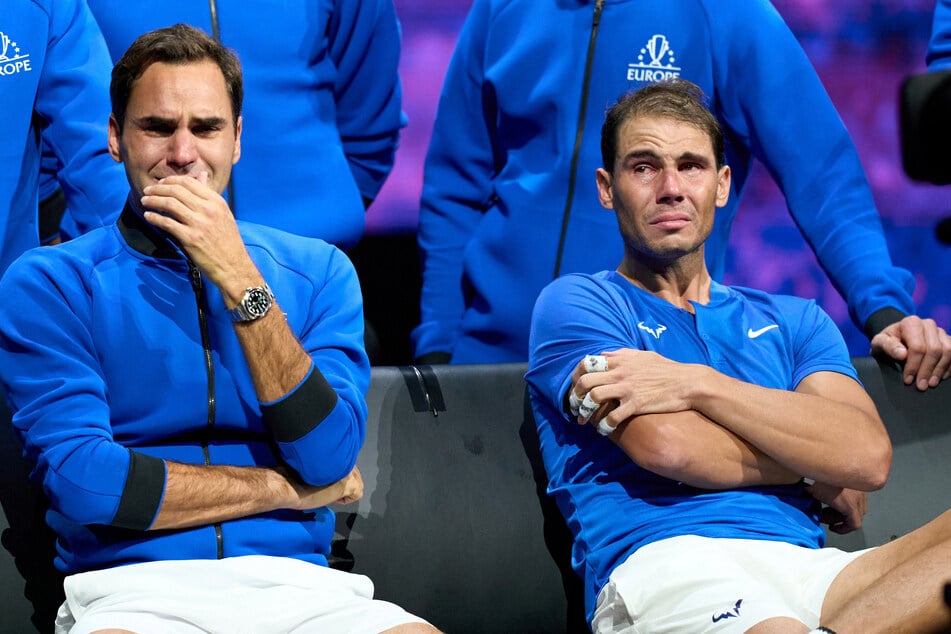 A tearful Rafael Nadal (r.) sits next to Roger Federer during the latter's last Laver Cup tennis match.