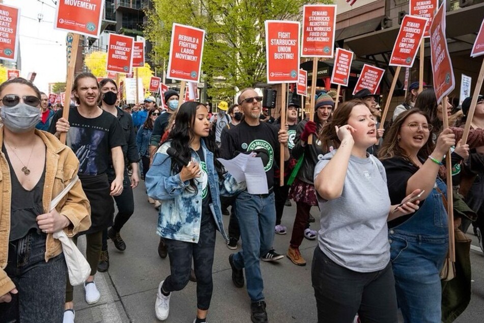 Starbucks Workers United organizers and supports march in Seattle to demand increased protections for workers and an end to corporate union-busting.