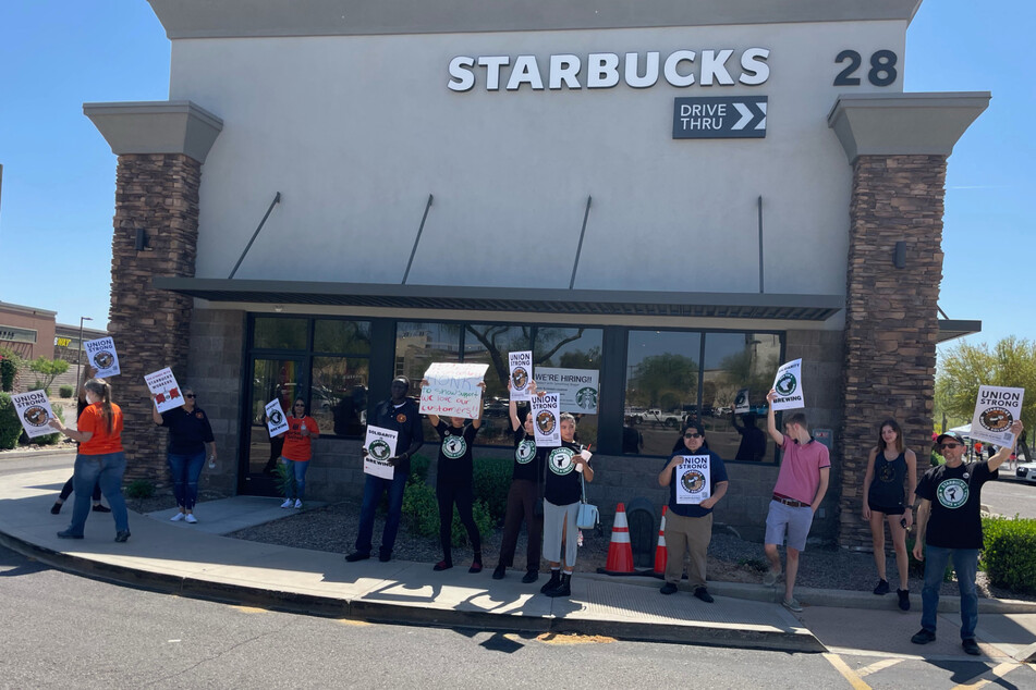 Starbucks organizers and allies protest at the Scottsdale and Mayo store, demanding that Sanchez and Dalton be reinstated.