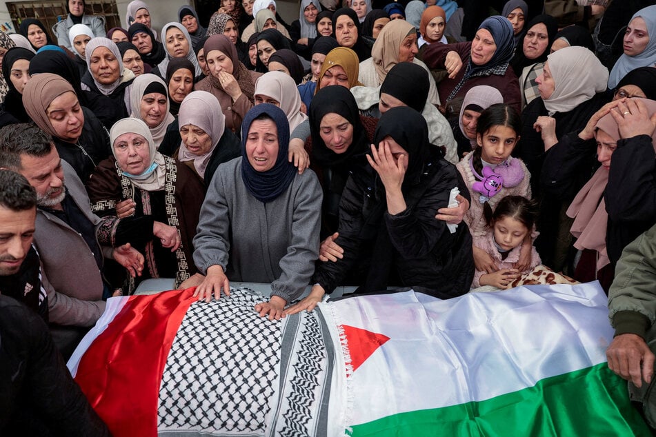Palestinians gathered to mourn four members of a family murdered by Israeli police in the illegally occupied West Bank.