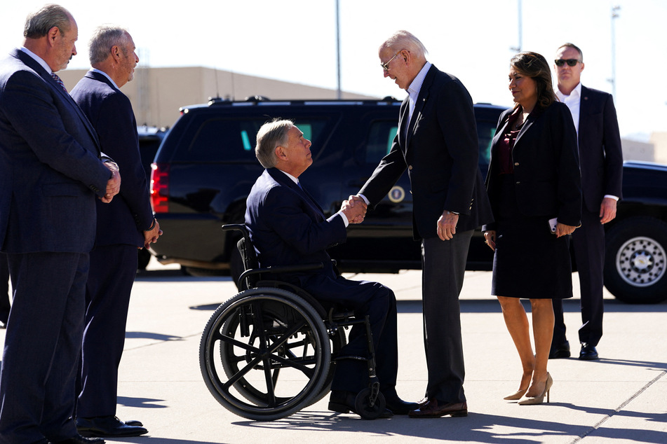 President Joe Biden being greeted by Texas Governor Greg Abbott in El Paso.