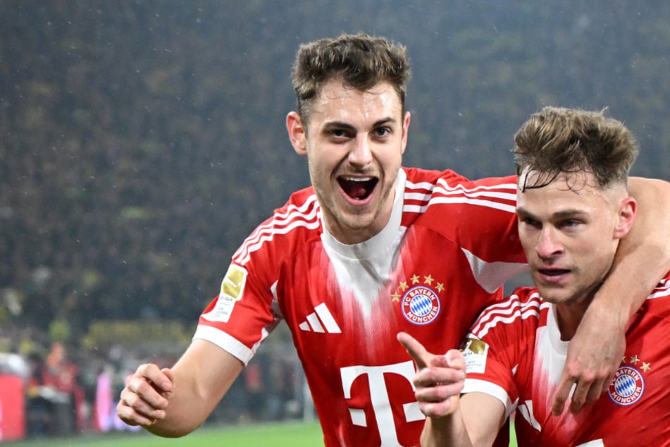 Joshua Kimmich (rechts) macht das Siegtor! Die Freude muss raus, auch bei Teamkamerad Josip Stanisic, der den Arm um den Mann legt, dem der Schlusspunkt gelungen ist.