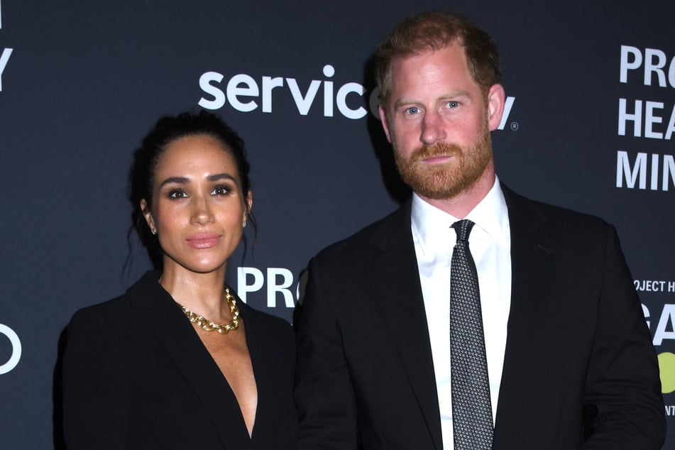 Meghan Markle (l.) and Prince Harry asked for the photos to be deleted out of respect for Remembrance Day.